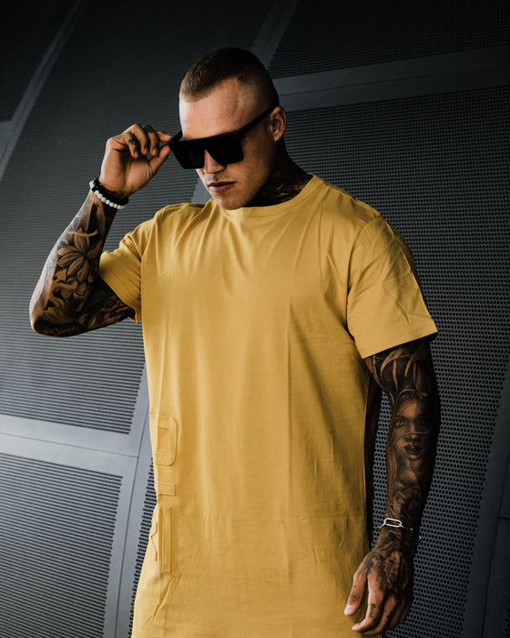 K-OS Tall Tee in Mustard - Campus Kollectiv